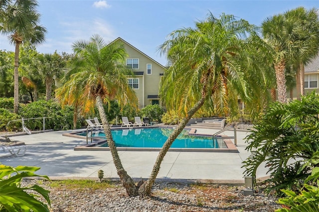 3721 S Lake Orlando Pkwy Unit 05, Orlando, FL 32808 - community pool featuring a patio area