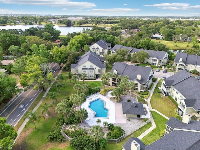 3721 S Lake Orlando Pkwy Unit 05, Orlando, FL 32808 - aerial perspective of suburban area with a pool and a large body of water