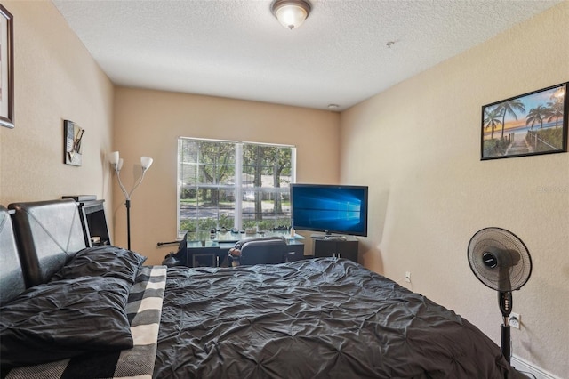 3721 S Lake Orlando Pkwy Unit 05, Orlando, FL 32808 - bedroom featuring a textured wall and a textured ceiling