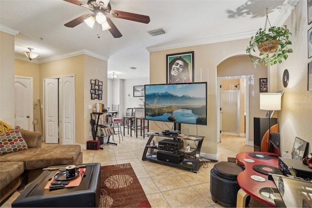 3721 S Lake Orlando Pkwy Unit 05, Orlando, FL 32808 - living room with light tile patterned floors, ornamental molding, ceiling fan, and baseboards
