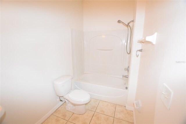 15349 Oak Apple Ct, Winter Garden, FL 34787 - bathroom featuring tile patterned flooring, toilet, baseboards, and shower / tub combination