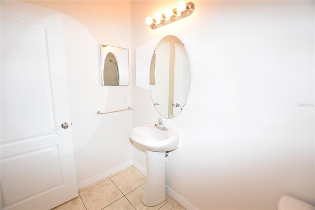 15349 Oak Apple Ct, Winter Garden, FL 34787 - half bath featuring tile patterned floors and baseboards