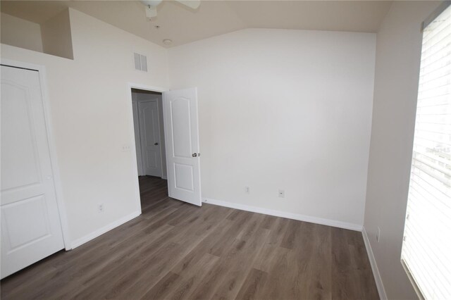 15349 Oak Apple Ct, Winter Garden, FL 34787 - unfurnished bedroom with lofted ceiling, wood finished floors, baseboards, and a ceiling fan