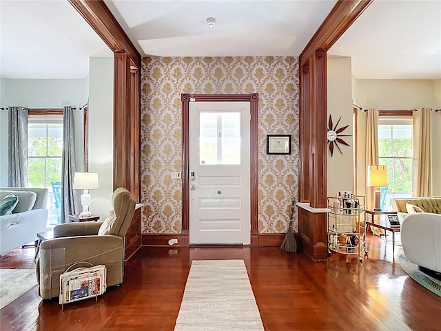 511 E Mirror Lake Dr, Fruitland Park, FL 34731 - living area featuring wood finished floors, baseboards, and wallpapered walls