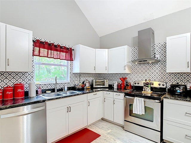 511 E Mirror Lake Dr, Fruitland Park, FL 34731 - kitchen with range hood, stainless steel appliances, a sink, dark countertops, and high vaulted ceiling