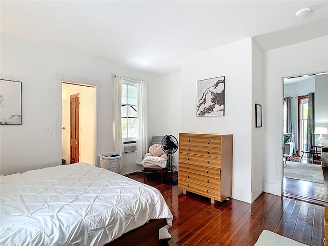 511 E Mirror Lake Dr, Fruitland Park, FL 34731 - bedroom with dark wood-type flooring