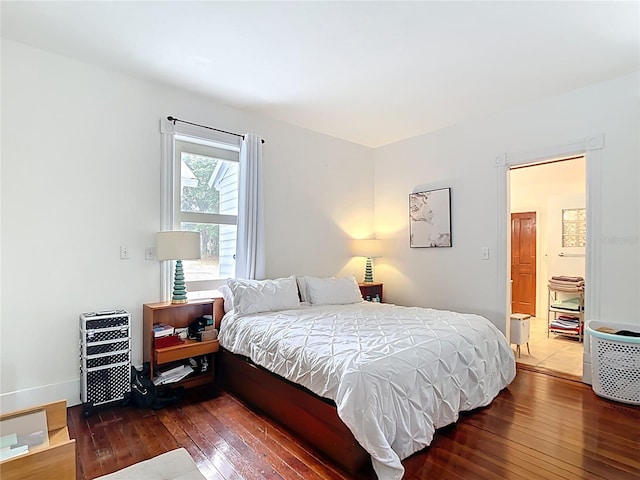 511 E Mirror Lake Dr, Fruitland Park, FL 34731 - bedroom with hardwood / wood-style floors