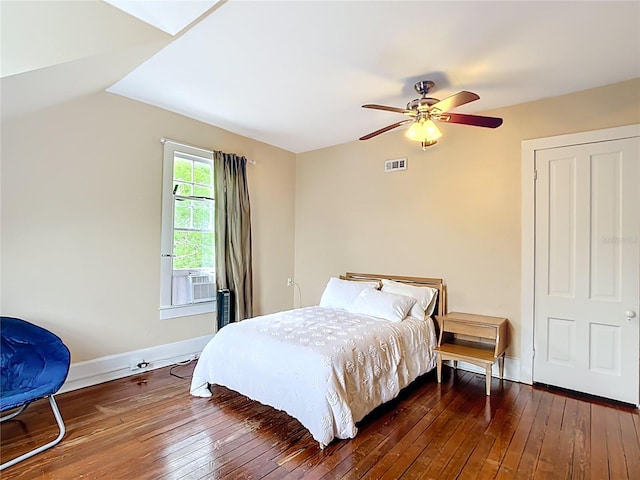 511 E Mirror Lake Dr, Fruitland Park, FL 34731 - bedroom with wood-type flooring, baseboards, vaulted ceiling, ceiling fan, and cooling unit