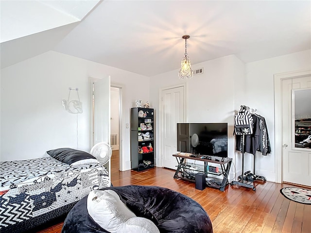 511 E Mirror Lake Dr, Fruitland Park, FL 34731 - bedroom featuring hardwood / wood-style floors