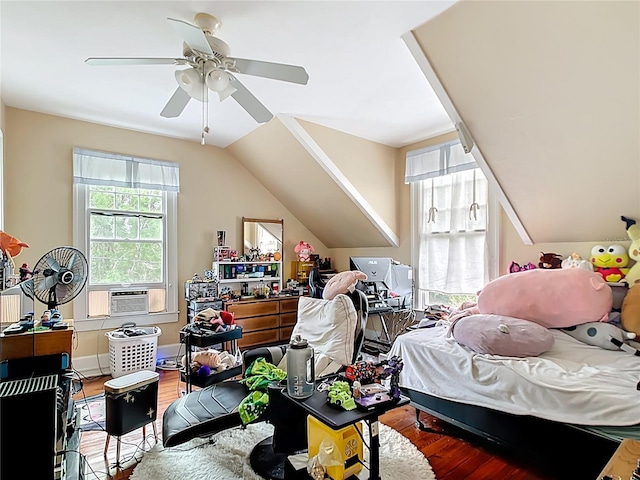 511 E Mirror Lake Dr, Fruitland Park, FL 34731 - bedroom featuring wood finished floors, cooling unit, vaulted ceiling, and a ceiling fan