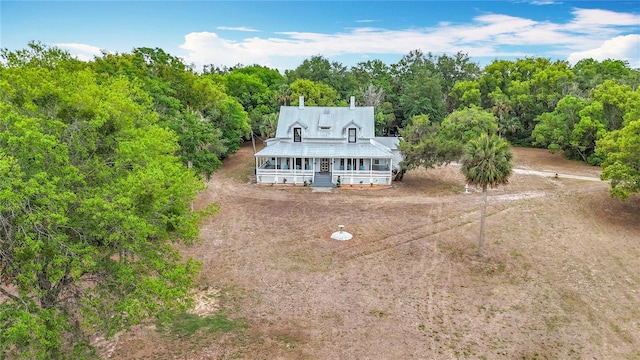 511 E Mirror Lake Dr, Fruitland Park, FL 34731 - view from above of property featuring a forest