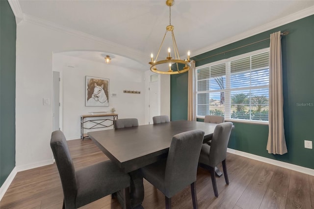 455 Lazio Cir, Debary, FL 32713 - dining space featuring a chandelier, wood finished floors, ornamental molding, and baseboards