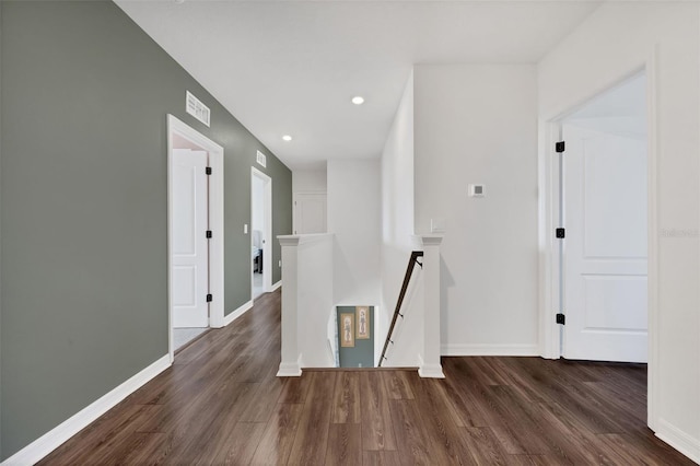 455 Lazio Cir, Debary, FL 32713 - corridor with an upstairs landing, wood finished floors, recessed lighting, and baseboards