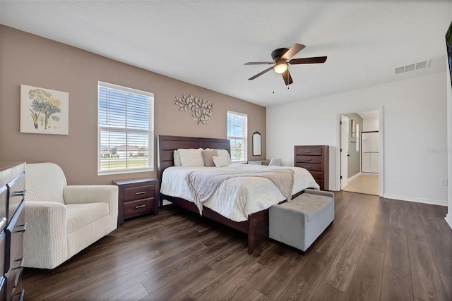 455 Lazio Cir, Debary, FL 32713 - bedroom with dark wood finished floors, ceiling fan, and baseboards