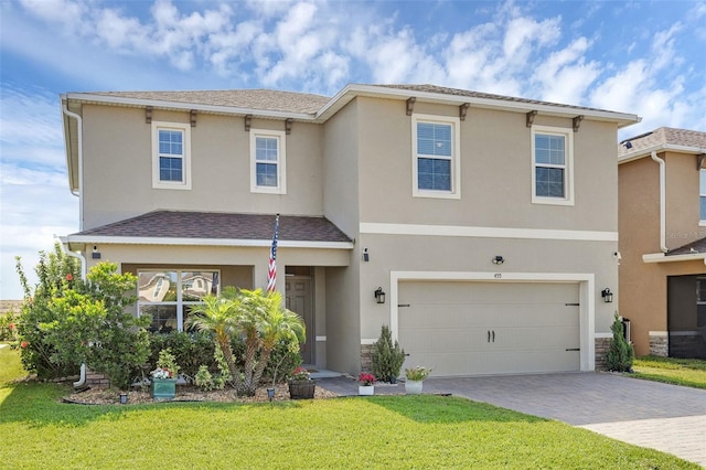 455 Lazio Cir, Debary, FL 32713 - view of front facade with driveway, stucco siding, a front lawn, and an attached garage