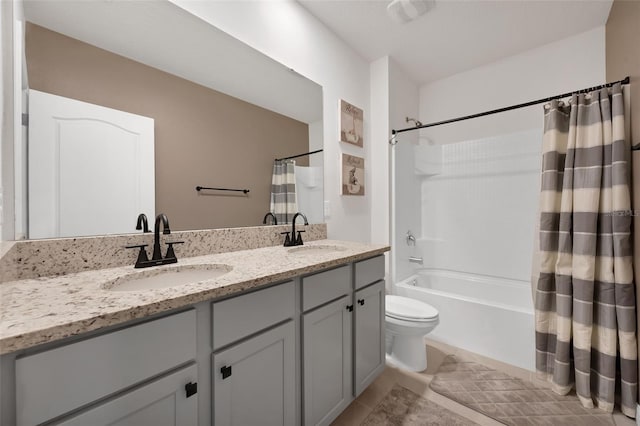 455 Lazio Cir, Debary, FL 32713 - bathroom featuring double vanity, shower / tub combo with curtain, tile patterned floors, and toilet