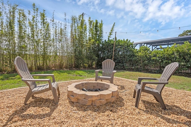 455 Lazio Cir, Debary, FL 32713 - view of green lawn with a fire pit