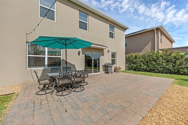 455 Lazio Cir, Debary, FL 32713 - view of patio with a grill