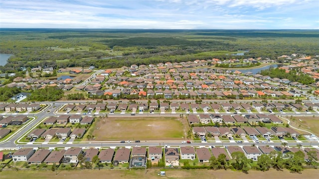 455 Lazio Cir, Debary, FL 32713 - aerial view of property's location featuring a forest, nearby suburban area, and a nearby body of water