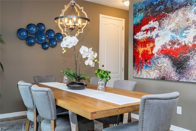 6543 Orange Cream Aly, Winter Garden, FL 34787 - dining room featuring a chandelier, baseboards, and wood finished floors