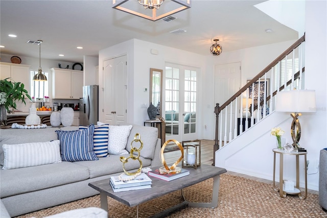 6543 Orange Cream Aly, Winter Garden, FL 34787 - living area with stairs, plenty of natural light, recessed lighting, and a chandelier