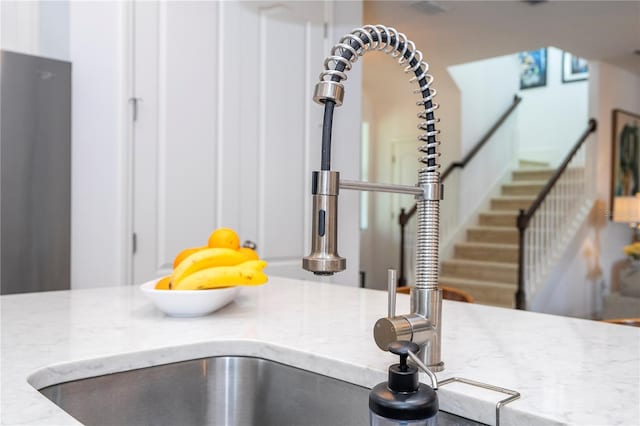 6543 Orange Cream Aly, Winter Garden, FL 34787 - kitchen view of light stone counters and a sink
