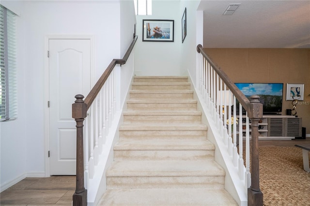 6543 Orange Cream Aly, Winter Garden, FL 34787 - stairs with wood finished floors and baseboards