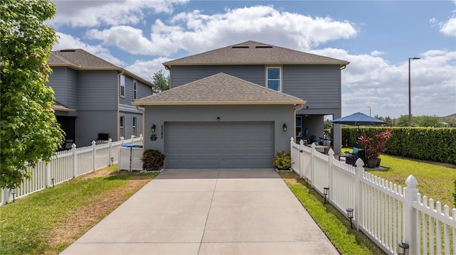6543 Orange Cream Aly, Winter Garden, FL 34787 - traditional-style house with an attached garage, a shingled roof, concrete driveway, and stucco siding