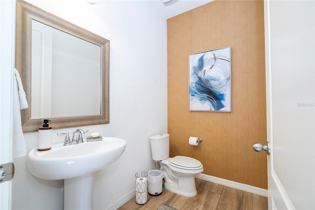 6543 Orange Cream Aly, Winter Garden, FL 34787 - half bath with toilet, wood finished floors, and baseboards