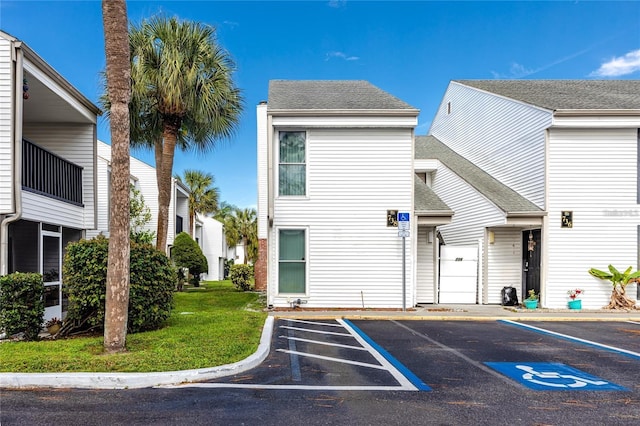 738 Haven Pl, Tarpon Springs, FL 34689 - view of property featuring uncovered parking