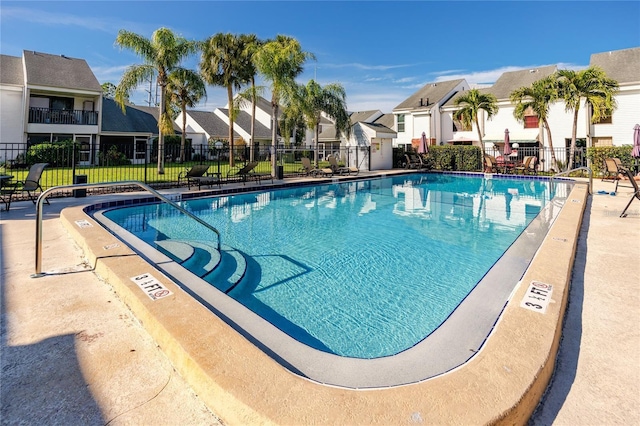 738 Haven Pl, Tarpon Springs, FL 34689 - community pool featuring a residential view
