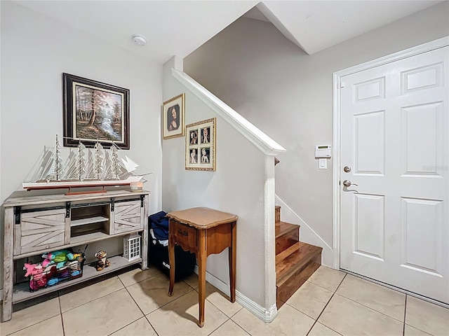 1027 Cedar Bay Ln, Winter Springs, FL 32708 - entryway with stairway and light tile patterned floors