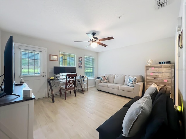 1027 Cedar Bay Ln, Winter Springs, FL 32708 - living area featuring light wood-style floors and ceiling fan
