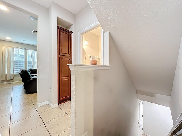 1027 Cedar Bay Ln, Winter Springs, FL 32708 - corridor with light tile patterned flooring and baseboards