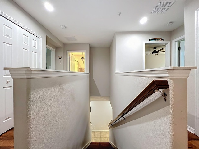 1027 Cedar Bay Ln, Winter Springs, FL 32708 - stairs with a ceiling fan, wood finished floors, and baseboards