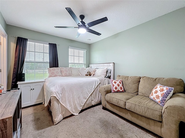 1027 Cedar Bay Ln, Winter Springs, FL 32708 - carpeted bedroom featuring a ceiling fan