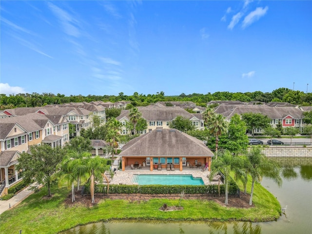 1027 Cedar Bay Ln, Winter Springs, FL 32708 - aerial perspective of suburban area with a pool area and a nearby body of water