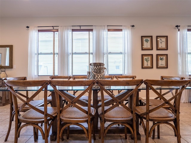311 W Falls Dr, Kissimmee, FL 34747 - dining area featuring light tile patterned flooring and plenty of natural light