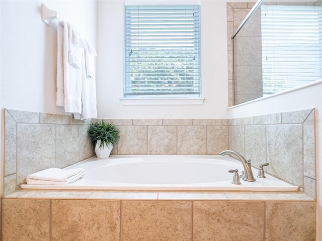 311 W Falls Dr, Kissimmee, FL 34747 - bathroom with a garden tub