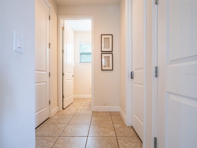 311 W Falls Dr, Kissimmee, FL 34747 - hall featuring light tile patterned floors and baseboards