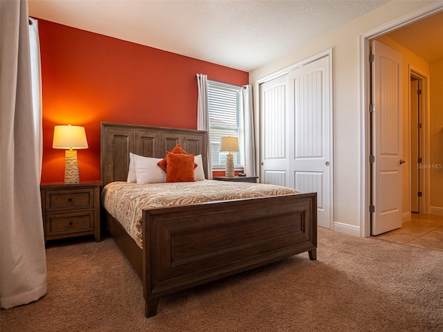 311 W Falls Dr, Kissimmee, FL 34747 - bedroom with light colored carpet and a closet