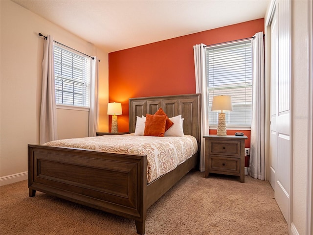 311 W Falls Dr, Kissimmee, FL 34747 - bedroom featuring light colored carpet and baseboards