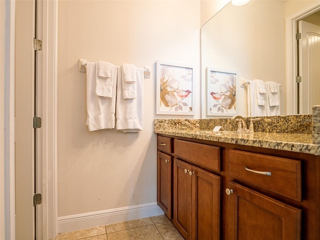 311 W Falls Dr, Kissimmee, FL 34747 - bathroom with baseboards, vanity, and tile patterned floors