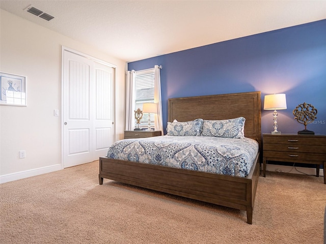 311 W Falls Dr, Kissimmee, FL 34747 - bedroom with carpet, a closet, and baseboards