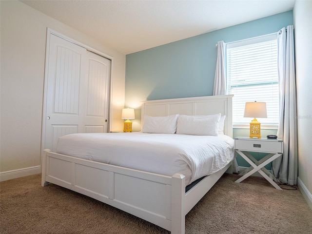 311 W Falls Dr, Kissimmee, FL 34747 - carpeted bedroom with a closet and baseboards