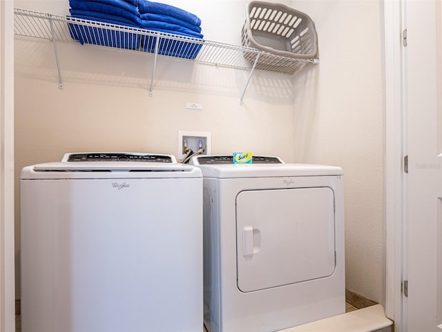 311 W Falls Dr, Kissimmee, FL 34747 - clothes washing area featuring separate washer and dryer
