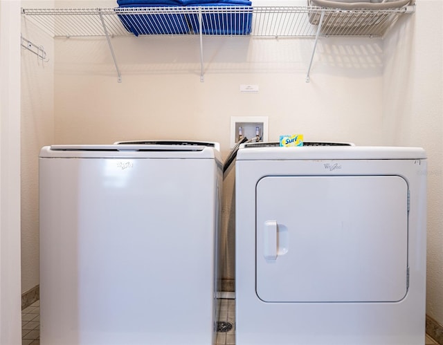 311 W Falls Dr, Kissimmee, FL 34747 - clothes washing area featuring washer and clothes dryer