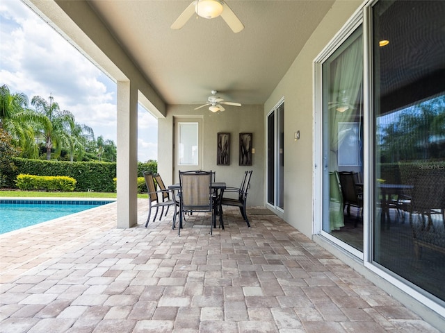 311 W Falls Dr, Kissimmee, FL 34747 - view of patio featuring a ceiling fan and outdoor dining space