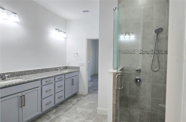 726 Coral Reef Way, Daytona Beach, FL 32124 - full bathroom with a stall shower, double vanity, and baseboards