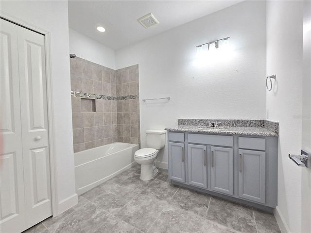 726 Coral Reef Way, Daytona Beach, FL 32124 - bathroom featuring toilet, vanity, baseboards, shower / washtub combination, and a closet